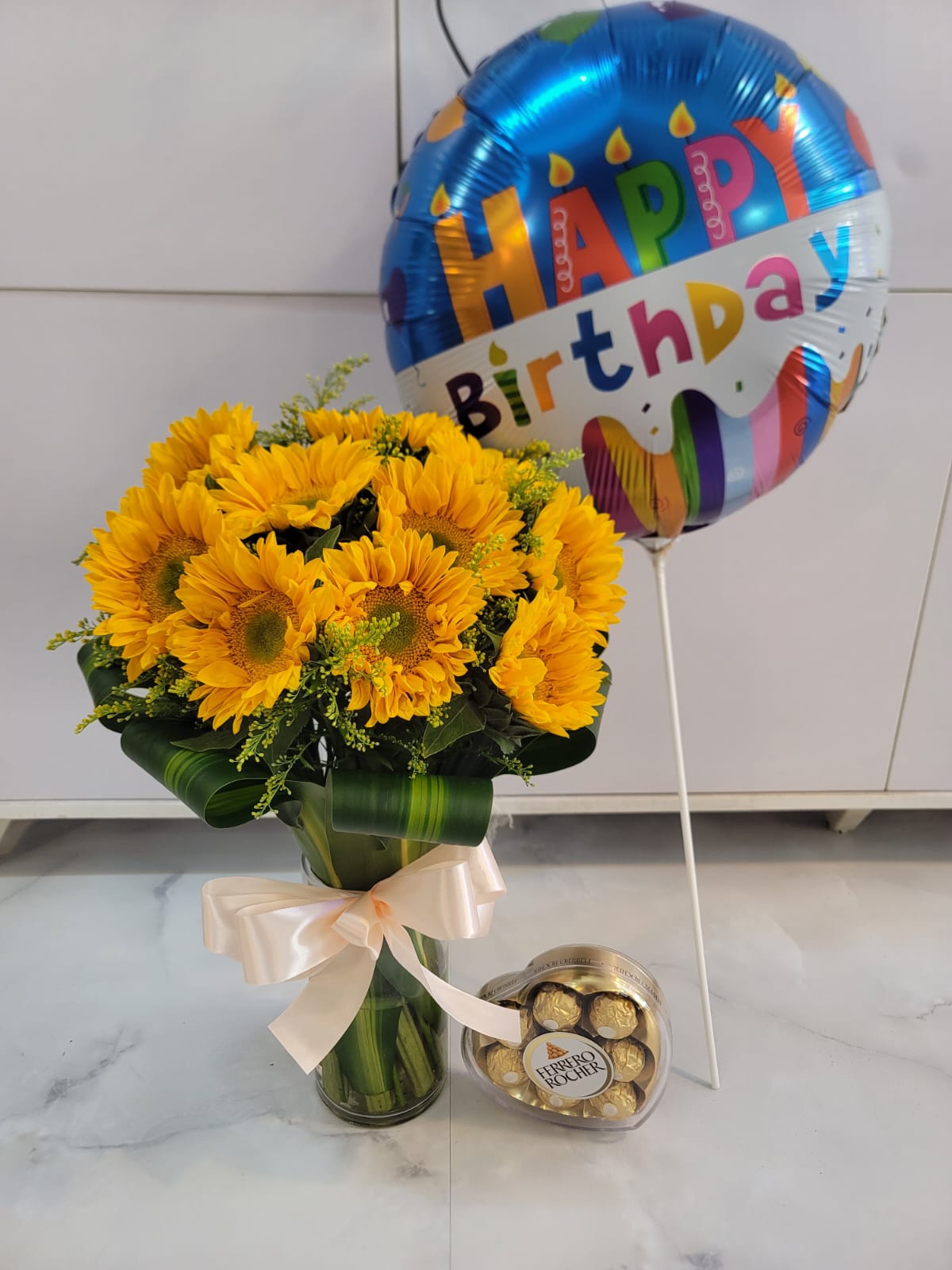 sunflower in vase package , chocolate  and air Balloon